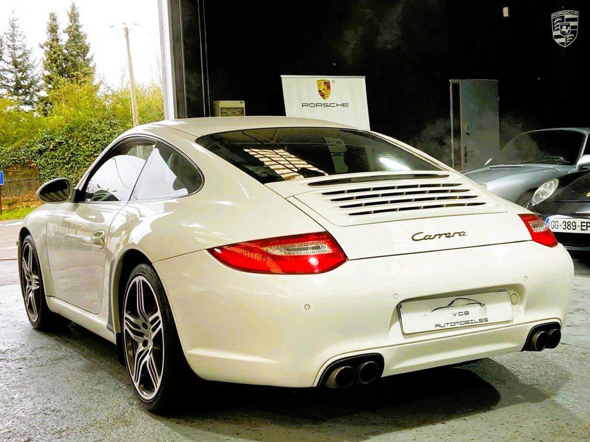 Porsche 997 Carrera 2009 — vue arriere trois-quarts (13)