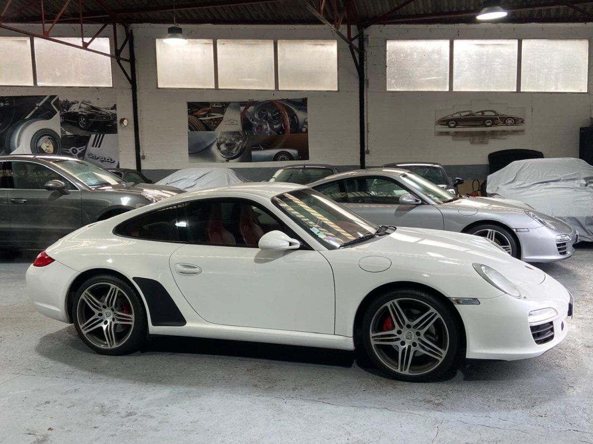 Porsche 997 Carrera 2009 — profil lateral (8)