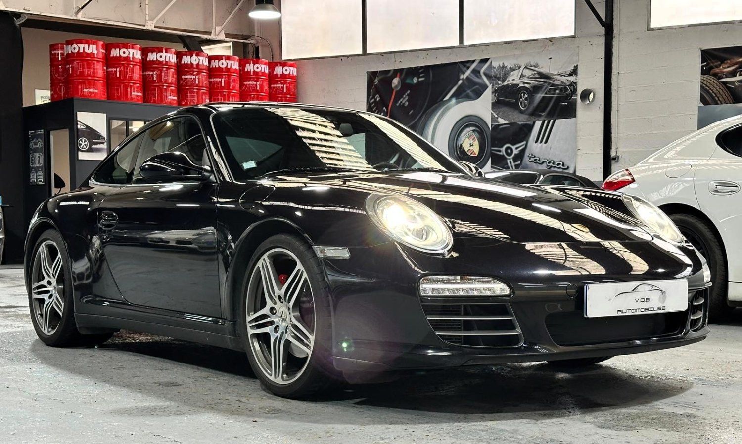 Porsche 997 Carrera 4S 2009 — vue avant trois-quarts (5)