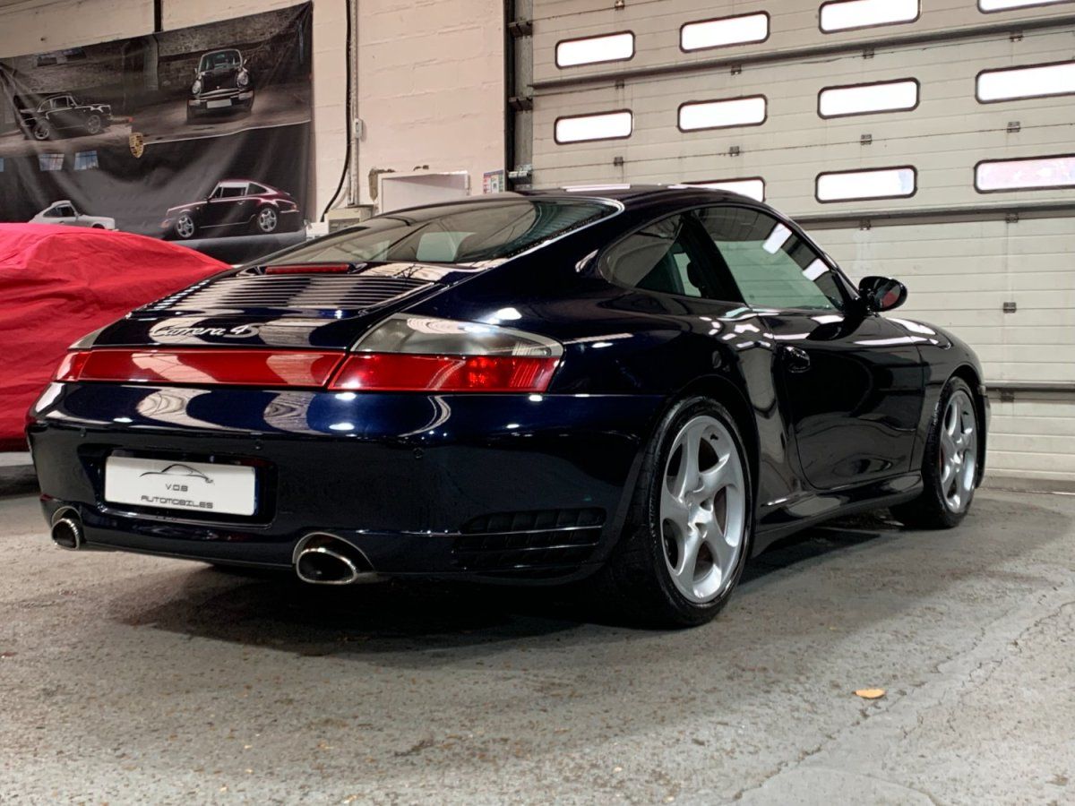 Porsche 997 Carrera 4S 2005 — vue arriere trois-quarts (8)